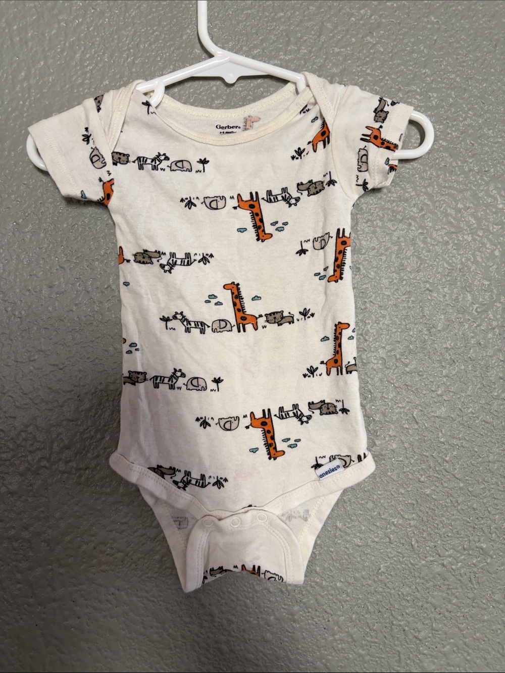 Baby One-Piece with Orange Giraffe Print